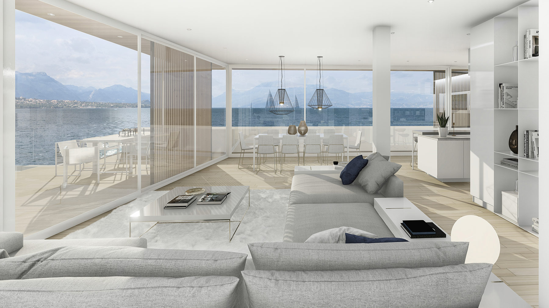 Soggiorno spazioso e moderno con vista panoramica sul lago attraverso ampie vetrate, arredato con un divano grigio a sezione, mobili da pranzo bianchi e illuminazione contemporanea, in un design interno minimalista.